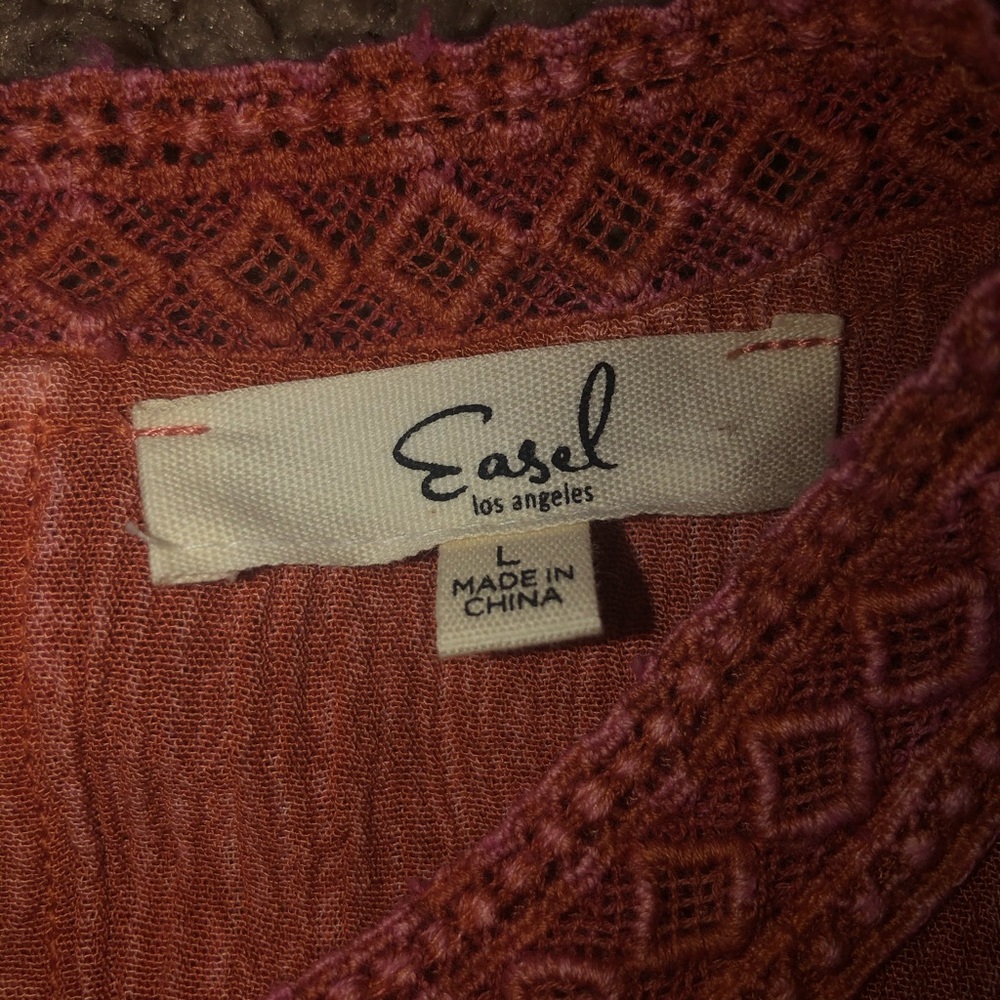 Orange dress with designs at the top
